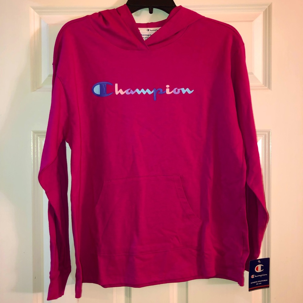 Pink long sleeve Champion hooded top.